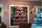 Painted trim. Striped wallcovering. Victoria's Secret Queen of Hearts theme